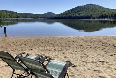 Image de Old Timberline Inn - Lake Front Home with Private Sandy Beach Caroga Lake, Ny
