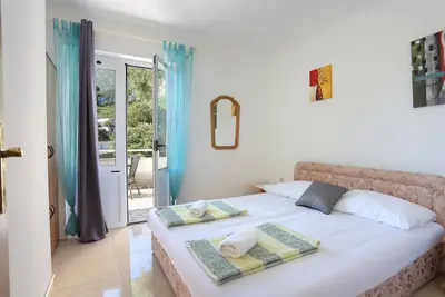 Image de Appartement de deux chambres avec le balcon et la vue sur le mer Zivogosce - Porat, Makarska (A-18218-c)