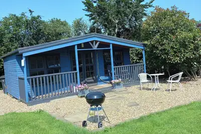 Image de Newly refurbished cabin with open green space included.