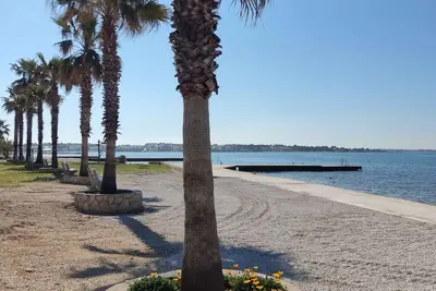 Image de Appartement de vacances avec air conditionné et vue sur la mer