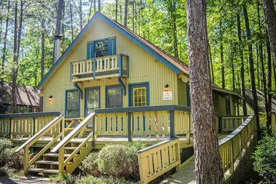 Image de Wooded View Chalet right beside our salt water pool!