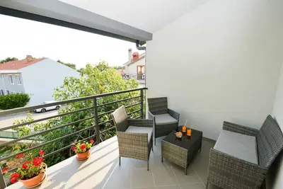 Image de Appartement de vacances avec terrasse, balcon et air conditionné