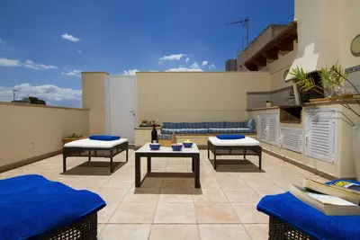 Image de Appartement de vacances \"Gran Apartamento en Puerto\" avec vue sur les montagnes, Wi-Fi et jardin