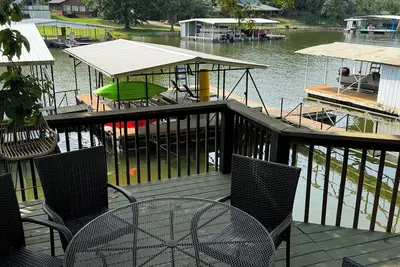 Image de Lakefront house with large deck, private boat dock, and covered outdoor games!