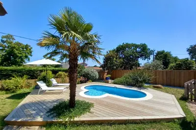 Image de Villa Fleur Maison au calme avec piscine et jardin arboré à 900m des plages
