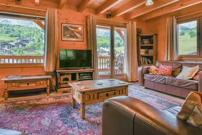 Image de Grand chalet mitoyen, 10 chambres, 20 pers, pied de pistes, garages, Wi-Fi, linge inclus!