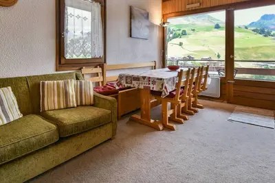 Image de Duplex chaleureux, 3 chambres, 7-9 pers. , proche commerces, vue pistes, garage privé