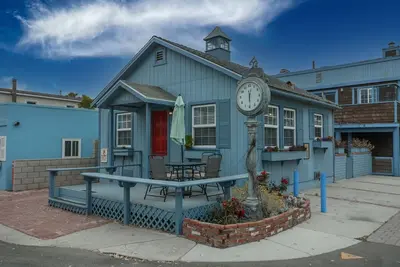 Image de Across quiet street from sandy beach.