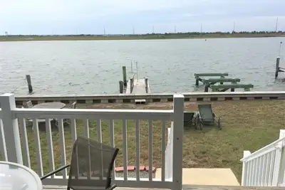 Bay-Front single family home that features expansive Intracoastal waterway views with easy Townsend inlet access