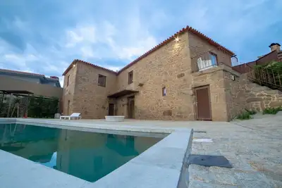 Image de Maison de vacances Villae Carreiro avec piscine, climatisation, Wi-Fi, jardin et terrasse