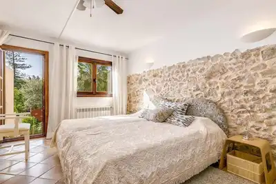 Image de Maison de vacances Casa Maria Angela avec terrasse ensoleillée, patio et connexion Wi-Fi