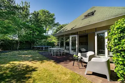 Image de A wonderful holiday accommodation in Park De Toekomst, just 10 minutes by bike from the beaches of Ouddorp.