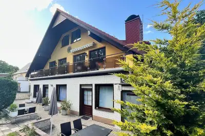 Image de In a quiet location, free use of swimming pool and sauna - Ferienhus Baabe FeWo 02