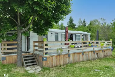 Image de Mobil home spacieux entre lac et montagne