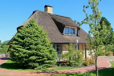 Image de Relax under thatch in the cozy \"Haus Imme\" - your retreat in St.