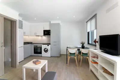 Image de Maison de vacances Casa Lopes près de la mer, avec climatisation, terrasse privée, et barbecue.