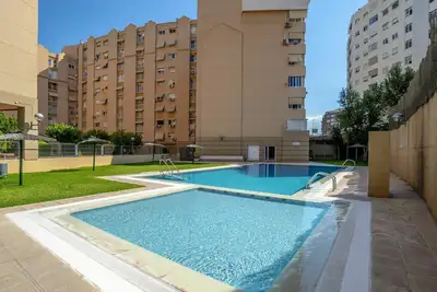 Image de Bel appartement pour 7 personnes avec climatisation, piscine, Wifi, Tv, terrasse et parking