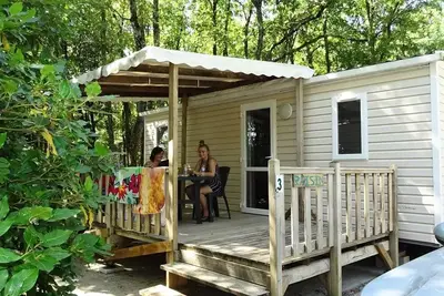 Image de Mobil home Domino Standard 24m² - 2 chambres + Tv + terrasse semi-couverte 10m² 4 personnes