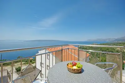 Image de Appartement de trois chambres avec le balcon et la vue sur le mer Krvavica, Makarska (A-18911-d)