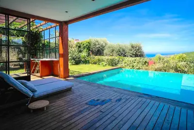 Image de Villa met Zeezicht en Loopafstand Naar het Strand. Verwarmbaar Privezwembad