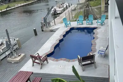 Image de Captains Quarter\/ canal front, private pool, dock for two boats.