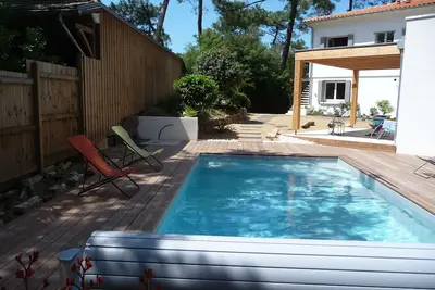 Image de Appartement T2 ( 2 *) dans villa avec piscine, la plage à pied