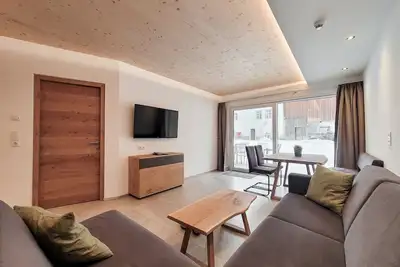 Image de 50m² modern vacation apartment with terrace, free bathing lake, 100m to the ski area