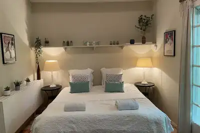 Image de A beautiful romantic bedroom with a mezzanine area, bathroom and private garden
