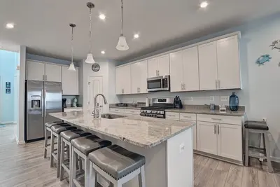 Image de Comfortable 3 Bedroom 2. 5 bath Townhouse in Ocean View Beach Club Community! Wifi Available, Pool, Fitness Center, Sauna, Weekend Beach Shuttle!