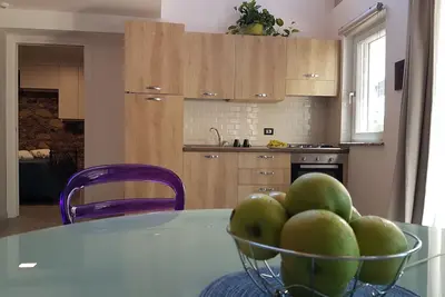 Image de Appartamento con Piscina