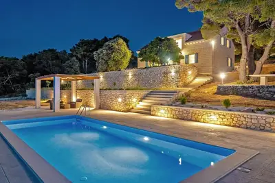Luxury Villa Castello di Pietra with private heated pool, private parking, gym, children are welcomed in Pučišća, Brač.