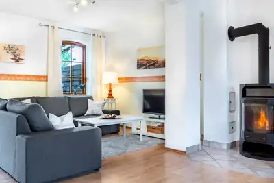 Image de Nr. 2 - 4 Zimmer Ferienwohnung mit Kamin, Terrasse, Garten - Ostsee Bauernhof Schwalbennest Ofc 15