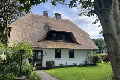 Image de Reetdachlandhaus Wiemershörn - vacation home, bathroom, Wc, 3 bedrooms
