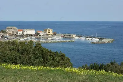 Image de Les Cyprès - Vue sur mer et le petit port de Santa Severa - Cap Corse