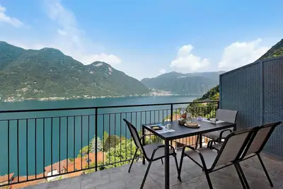 Image de Appartamento 8 Il Tornante avec vue sur le lac et les montagnes, Wi-Fi, A\/C & Balcon