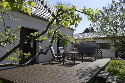 Image de Stylish and modern vacation apartment near the Müritz with large balcony. Terrace and fireplace