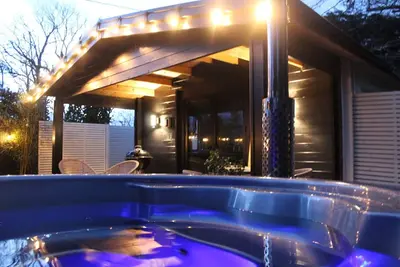 Image de White River Retreats Log Cabin with Wood Fired Hot Tub