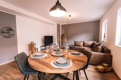 Image de Stylische Wohnung im Zentrum von PrĂĽm