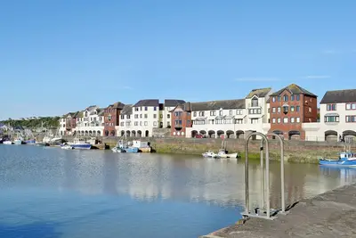 Image de A well furnished property with stunning views over the harbour to the Scottish Hills.