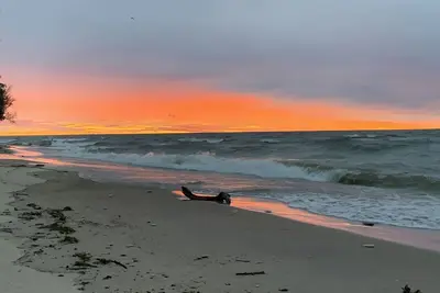 Image de Enjoy Breathtaking Sun Rises On The Sandy Lake Michigan Shoreline!