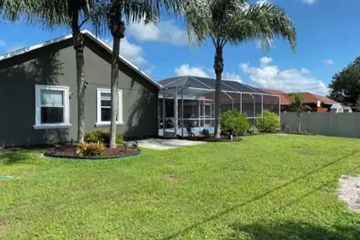 Image de Short drive to the beach, or stay by the pool.