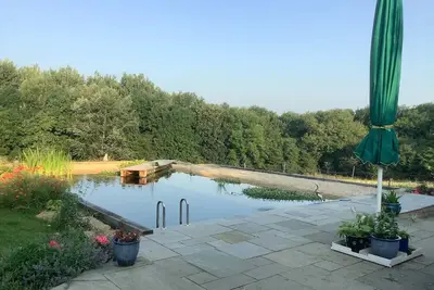 Image de A Cottage and The Railway Carriage with use of a Natural Pool.