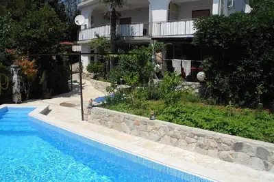 Image de Appartement de vacances avec piscine extérieure à seulement 30 mètres de la plage
