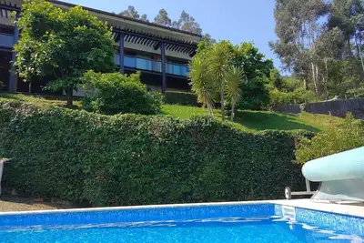 Image de Vila de luxo com Piscina - Tennis - Pousada Rio Caldo - GĂŞres