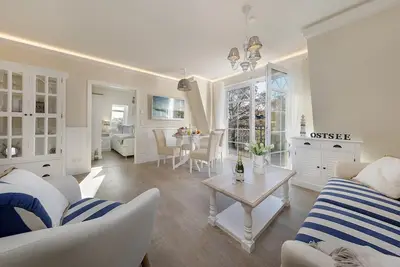 Image de Luxury vacation apartment right by the sea with sauna and fireplace.