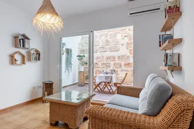 Image de Appartement Can Tosca avec patio, climatisation et Wi-Fi ; Garage disponible