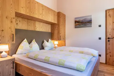 Image de Appartement \"Guntschöllerhof Mendelkamm\" avec vue sur les montagnes, Wi-Fi, balcon et jardin