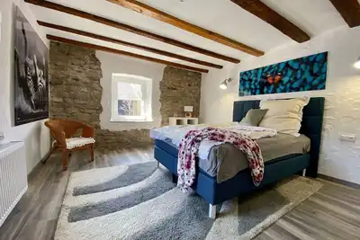 Image de Maisonette Eifel, vacation with sauna and whirlpool