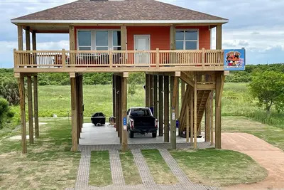 Image de Hippo Hut, A Tx Beach Vacation home. 3 bedroom 2 bath home with a bonus bunk room. Sleeps 11. The