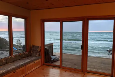 Image de Beautiful custom built cedar cottage with sandy cove and beach on Lake Michigan!